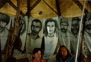 portraits lining tepee